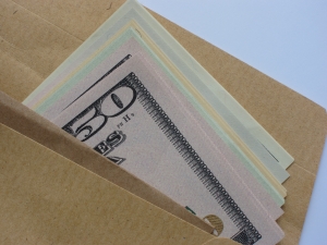 CEO and Managing Partner of Wall Street Broker-Dealer Charged in Massive International Bribery Scheme